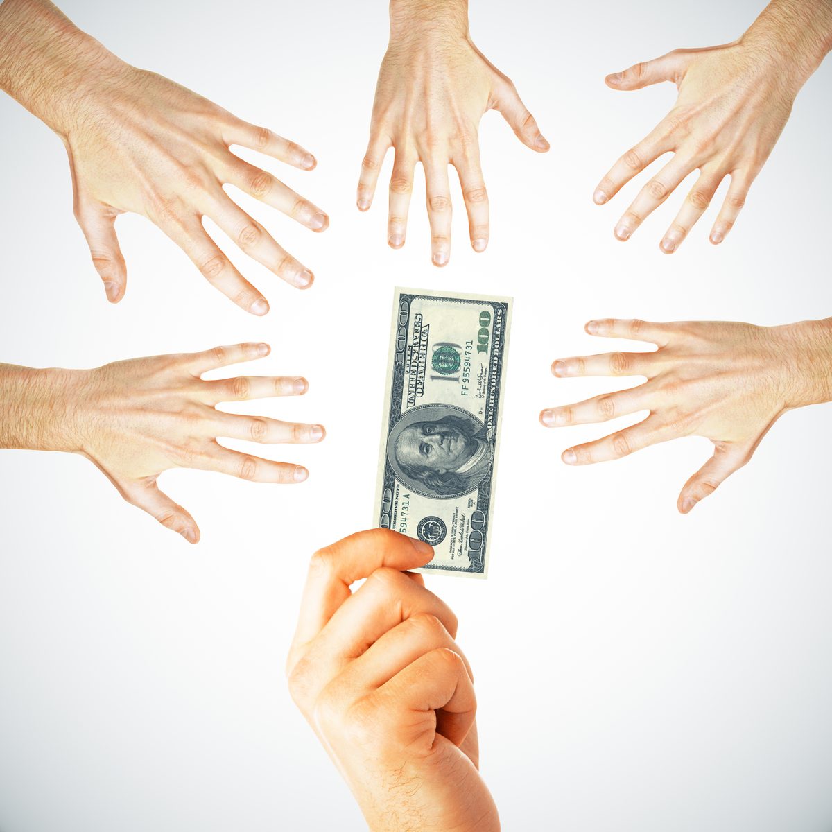 Many hands reaching for money